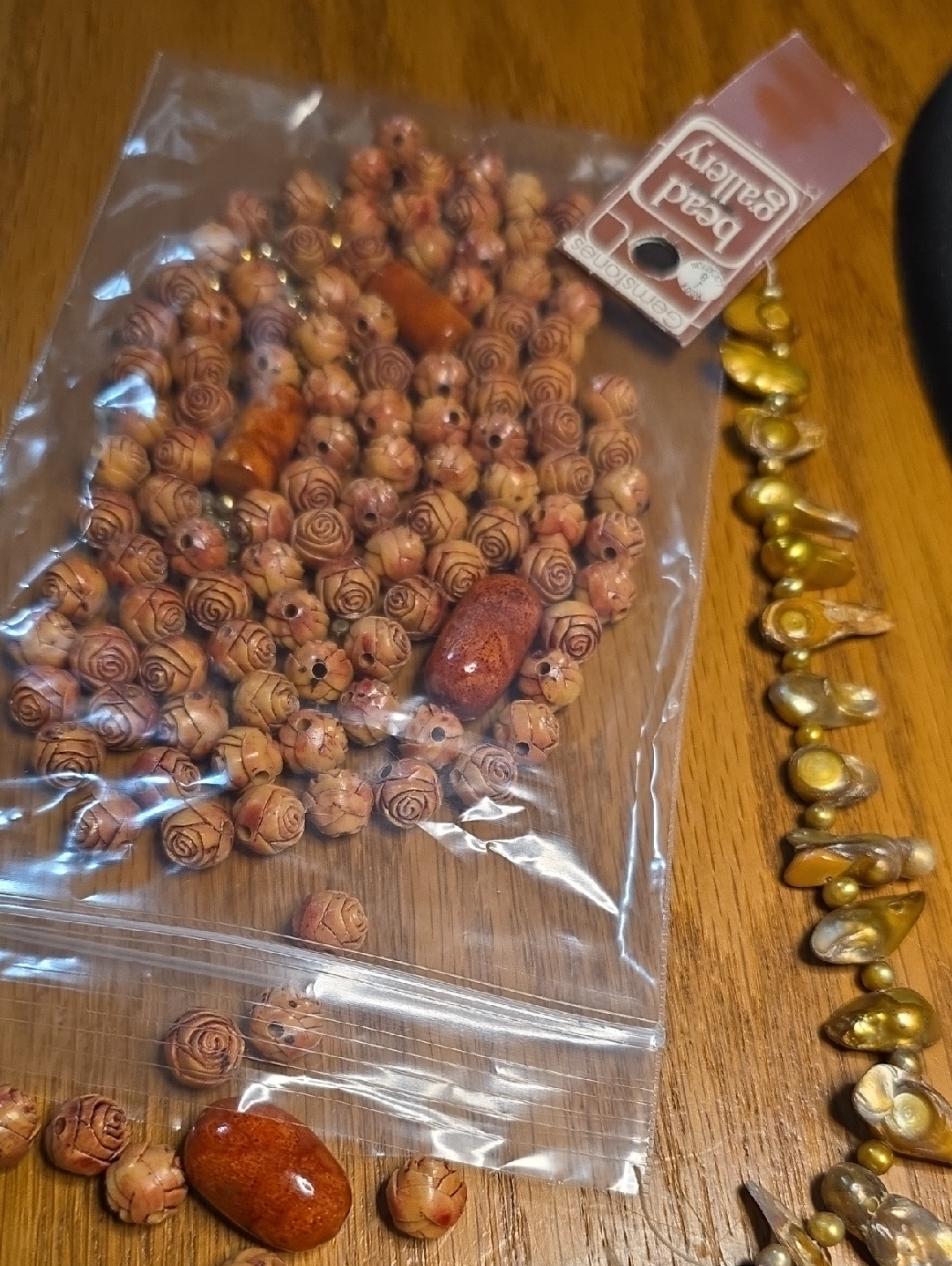 Rose Beads And Shell Strand 12$